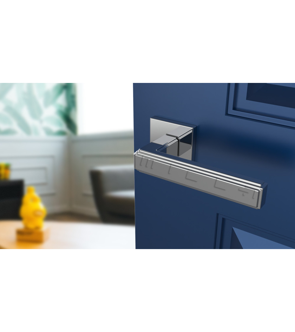 chrome door handle on a blue door