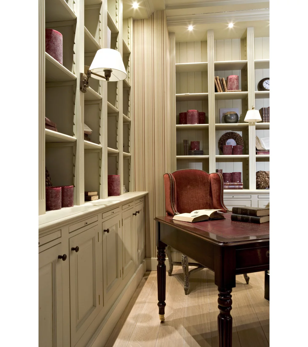 Vintage-style office with bookcase fitted with iron furniture knobs and handles